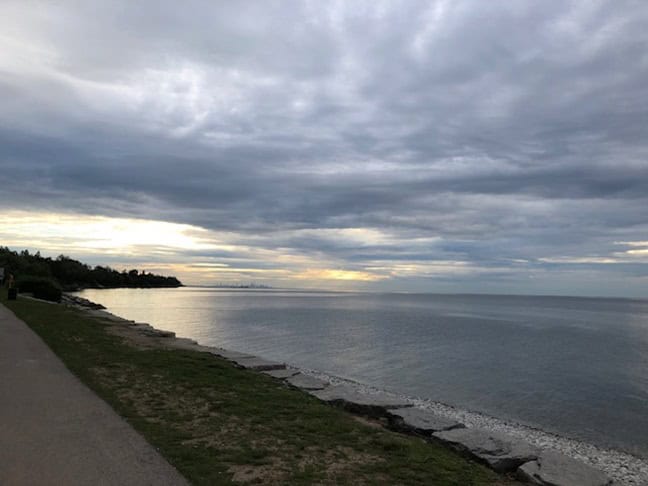 Author’s colour photograph of late sunrise looking eastward across Lake Ontario from Lakeside Park, June 2024.